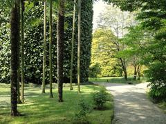 Botanical garden on Isola Madre Stresa Italy with lush greenery and historic buildings