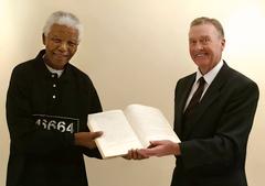President Nelson Mandela with The Hon. Donald Card standing together