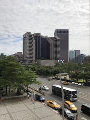 View of Grand Hyatt Taipei from the 4th floor restroom of Taipei City Hall building, showing the hotel and City Hall Road