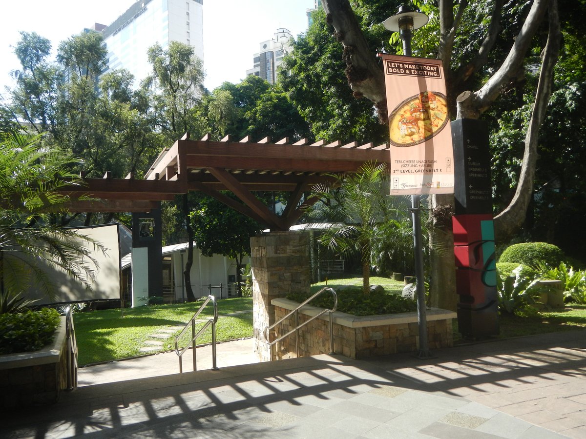 Ayala Center with The Link Carpark, Landmark department store, Santo Niño de Paz Chapel, Greenbelt and its organic garden in Makati Central Business District, Philippines