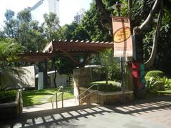 Ayala Center with The Link Carpark, Landmark department store, Santo Niño de Paz Chapel, Greenbelt and its organic garden in Makati Central Business District, Philippines