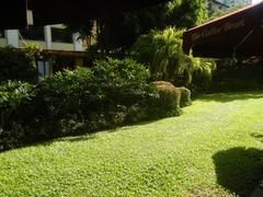 Makati Central Business District showing The Residences at Greenbelt, Ayala Land buildings, Corinthian Plaza, Paseo de Roxas, Greenbelt Park, Santo Niño de Paz Chapel, Greenbelt Organic Garden, Tarragon and Basil fields near Ayala MRT Station
