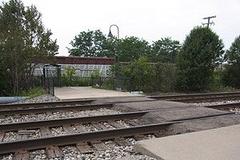 Former pedestrian crossing at closed Greenfield Village station in August 2015