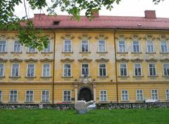 Gruber Hall building in Ljubljana with classical architectural style under blue sky