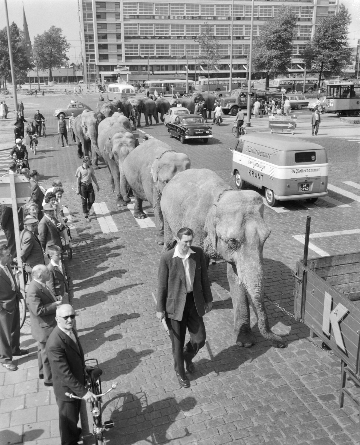 Arrival of Circus Krone in Rotterdam on May 26, 1959 with circus wagons and workers