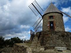 Moulin De La Cortina windmill in Argelès-Sur-Mer, France on a sunny day