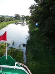 Elbląg Canal in Poland with water, boats, and surrounding greenery