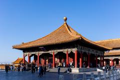 Interior of the Hall of Central Harmony in the Forbidden City with traditional Chinese architecture and ornate ceiling