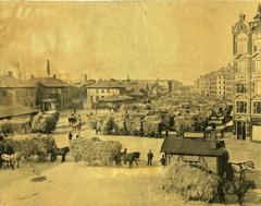 Historic Halmtorvet square in Copenhagen around 1900 with vintage horse-drawn carriages and people