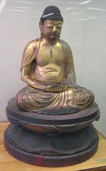 Seated Amida Buddha wood sculpture with gold over black lacquer, 15th century Japanese art