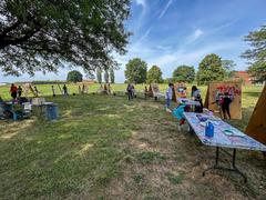 Children painting at summer camp painting stations