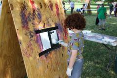 Children painting outdoors at Hampton National Historic Site during Baltimore County Parks and Recreation summer camp