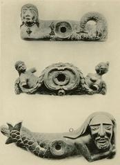 Decorative wooden barrel stave with intricate carvings from the Alsatian Museum collection