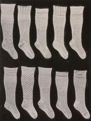 Hand-knitted cotton peasant stockings with decorative patterns