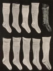Hand-knitted traditional cotton peasant stockings with decorative patterns