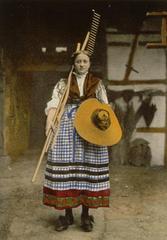 Woman wearing traditional Engwiller haymaking costume in 1910