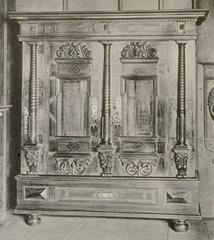 17th century decorative wooden armoire from Strasbourg with intricate carvings and painted details