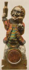 Decorative sign featuring Bacchus riding a barrel, traditional emblem of a drinking guild or tavern in Ensisheim