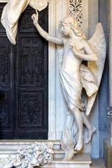 Restored cemetery monument with guiding angel statue