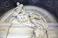 Restored cemetery monument featuring nine cherubim sculptures