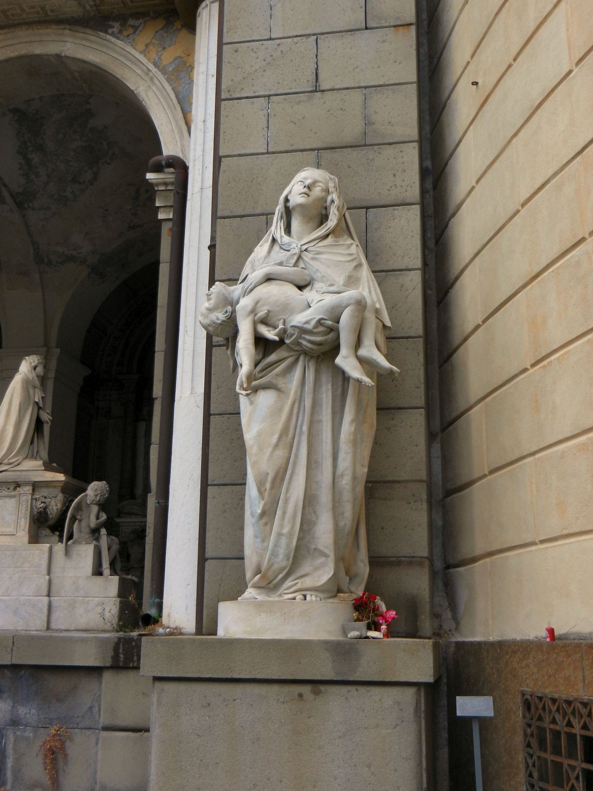 Carità statue in Staglieno Cemetery Genoa Italy