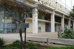 Harry Ransom Center building at University of Texas at Austin under blue sky