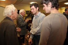 Former Canadian and U.S. diplomats Michael Shenstone and Robert Anders conversing with University of Toronto students during a Q&A on the Iran Hostage Crisis