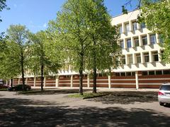 Vilnius Pedagogical University building with modern architecture and flags