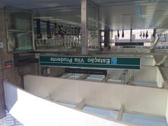 Entrance to Vila Prudente Station with pedestrian walkway and modern design