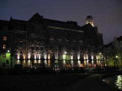 Helsingin työväentalo building illuminated at night