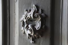 Front doors of Rust en Vreugd with intricate carvings in Cape Town