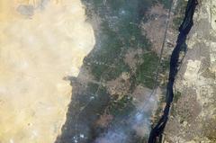 View of Memphis in Lower Egypt from the International Space Station with Nile River and surrounding desert landscape
