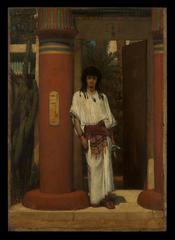 Egyptian man standing in a doorway with ancient Egyptian attire and architectural elements