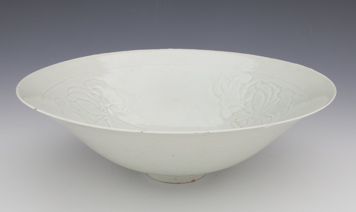 Qingbai ware bowl with relief floral decoration from 12th-13th century