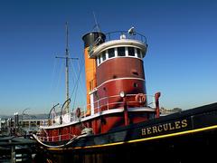 Hercules steam powered tugboat docked with its original triple expansion steam engine visible