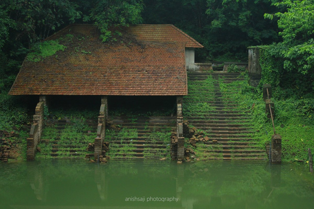 Tripunithura palace pond with traditional architecture