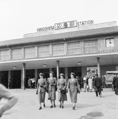 Four members of the Royal Australian Army Nursing Corps leaving Hiroshima Station for a city tour in 1955
