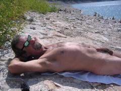 Hippie Hollow Park scenic view with rocky shore and clear water in Austin Texas