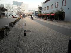 Theater courtyard with stone walls and pathways