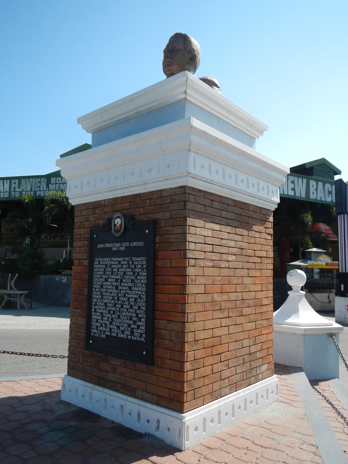 Don Honorio Ventura Technological State University building beside Bacolor Public Market and Crissot statue in Bacolor, Pampanga