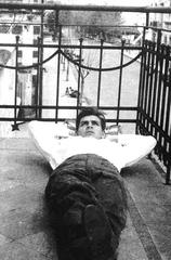 20 year old Ernesto Guevara lying contemplatively on balcony of family home in Buenos Aires