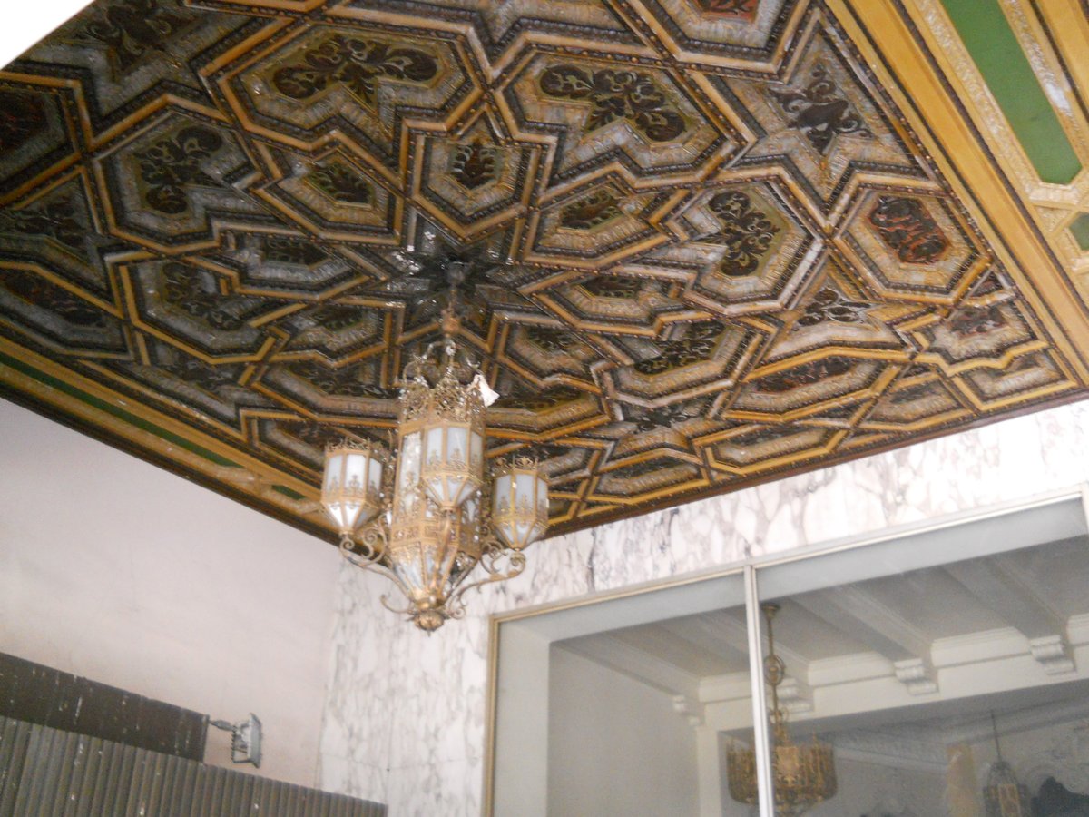 Ornate ceiling and lighting fixture at entrance of historic Hollywood Pacific Theatre