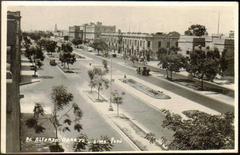 Av Alfonzo Ugarte avenue in Lima Peru with vehicles and buildings