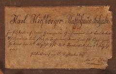 Backside label of portrait featuring Karl Hißberger, coffee house owner, with historical text in German