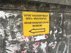 Sign in Yerevan on Baghramyan Avenue with Armenian text and street view