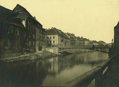 Historic photograph of 1895 Ljubljana earthquake damage showing Hribar Embankment and Hradecky Bridge
