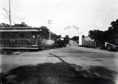 Electric streetcar passing Hyde Park entrance in 1890s