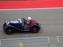 Vintage cars lined up at the 2014 Circuit of the Americas event