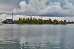 Aerial view of Tervasaari island in Helsinki surrounded by water and cityscape