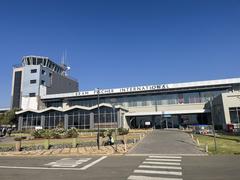 Braam Fischer International Airport terminal building with parked planes